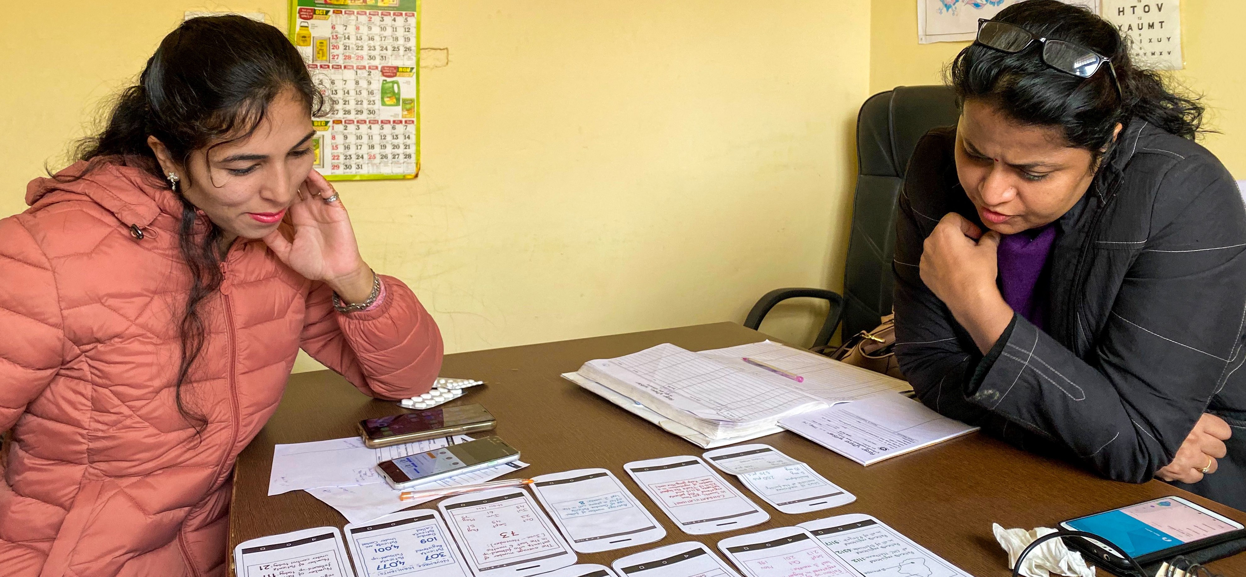 A nurse and a Community Health Officer sharing their ideas for Simple at a Health and Wellness Centre in Bathinda, Punjab