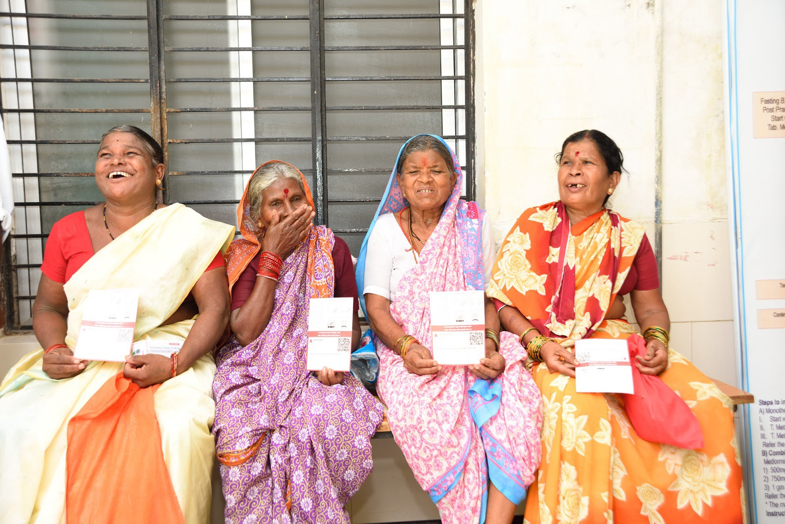 Patients with 'BP Passports', an ID system for Simple. Over 50,000 BP Passports have been distributed to patients.